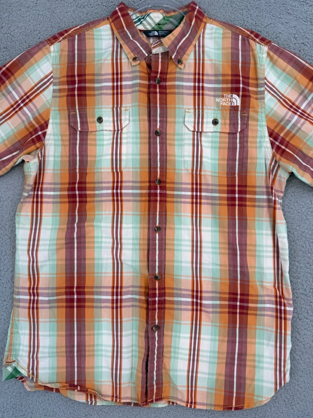 The North Face Men’s Large short sleeve button down shirt Orange Plaid outdoors